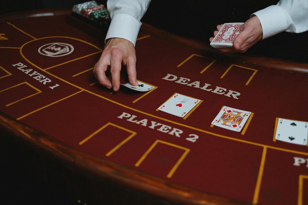 Image of dealer laying out cards